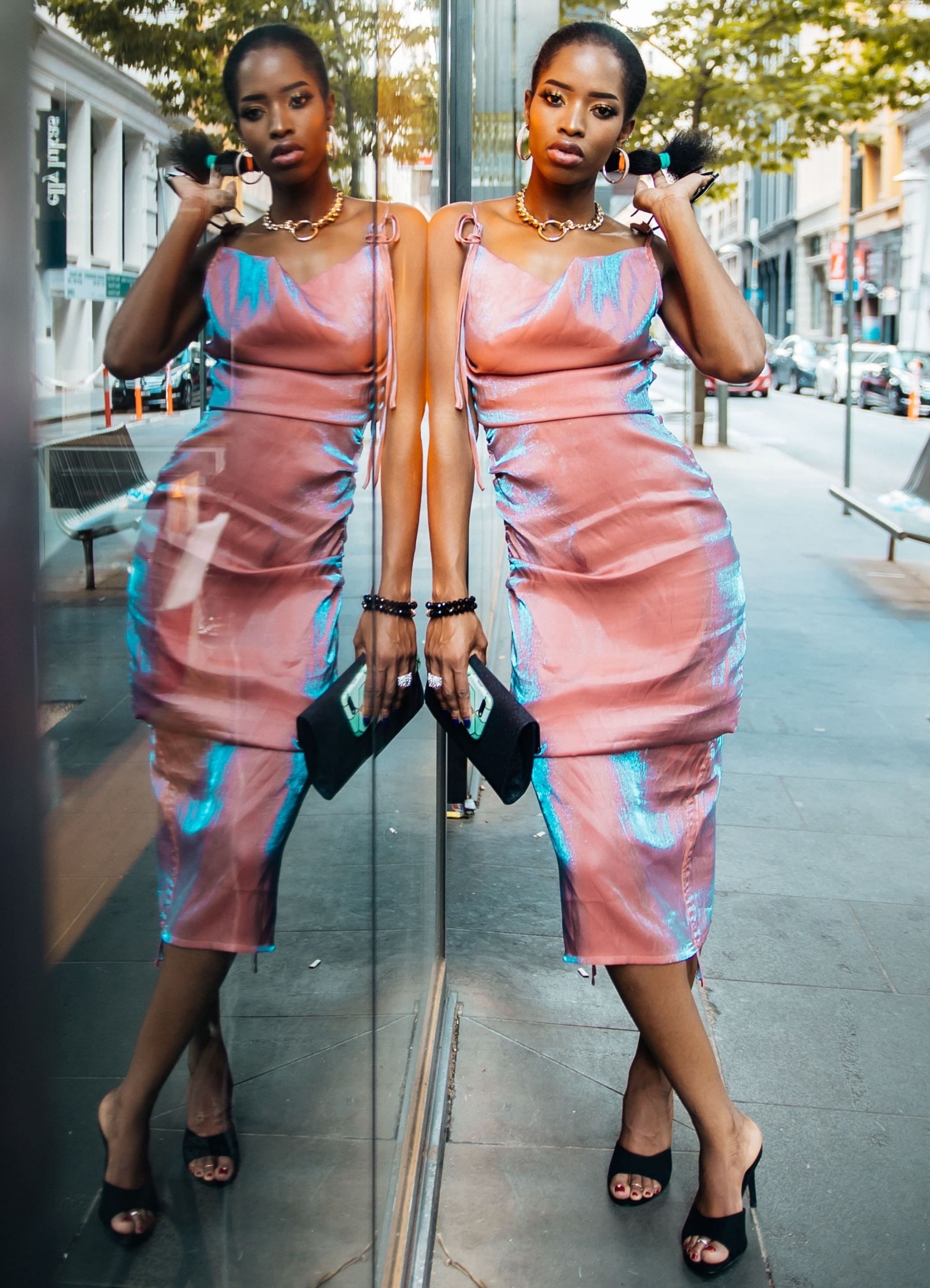 Holo and shiny outfit for AW21. Photo by Ahadi Lulerhe, Unsplash
