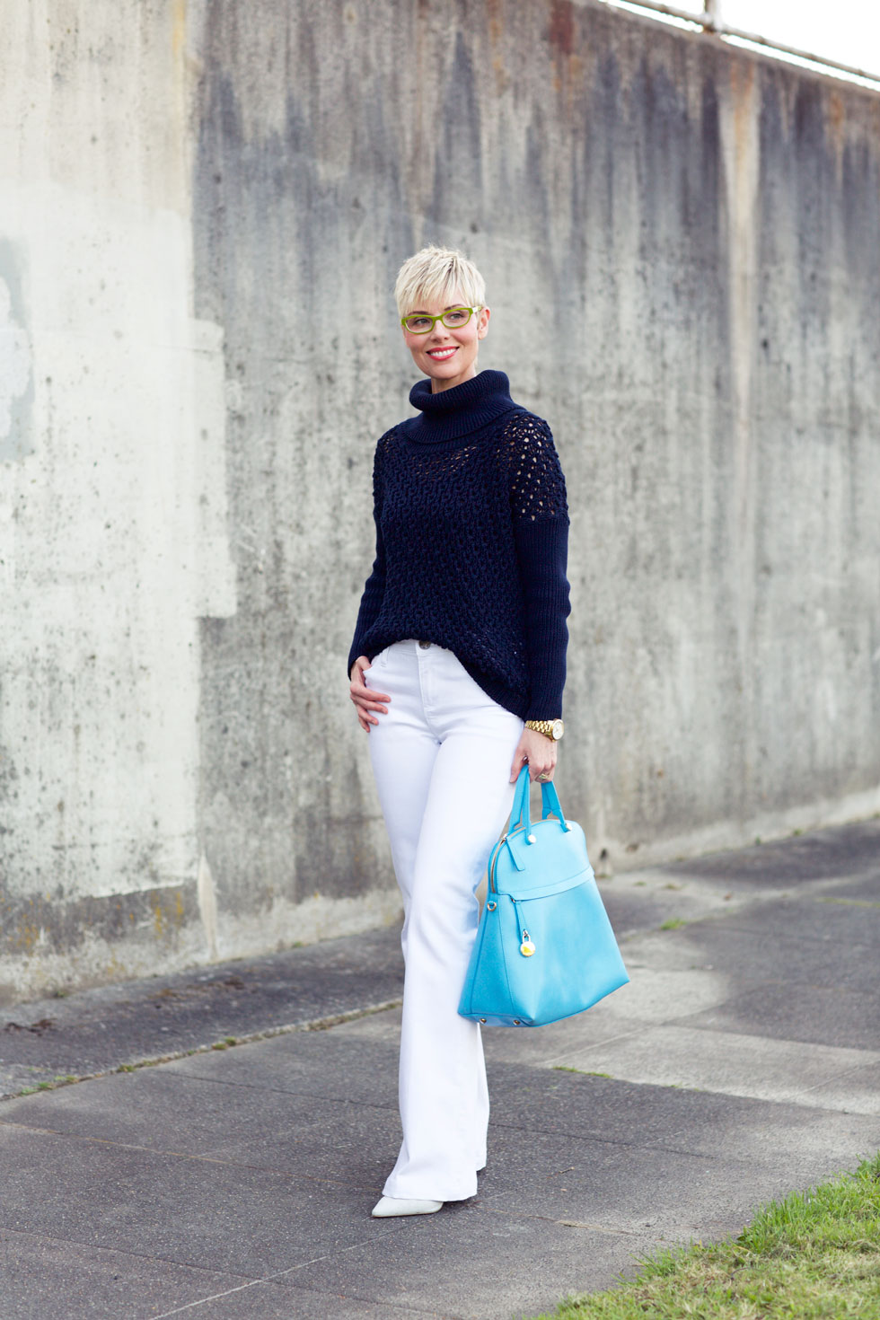 4. classic sweater with modern white pants